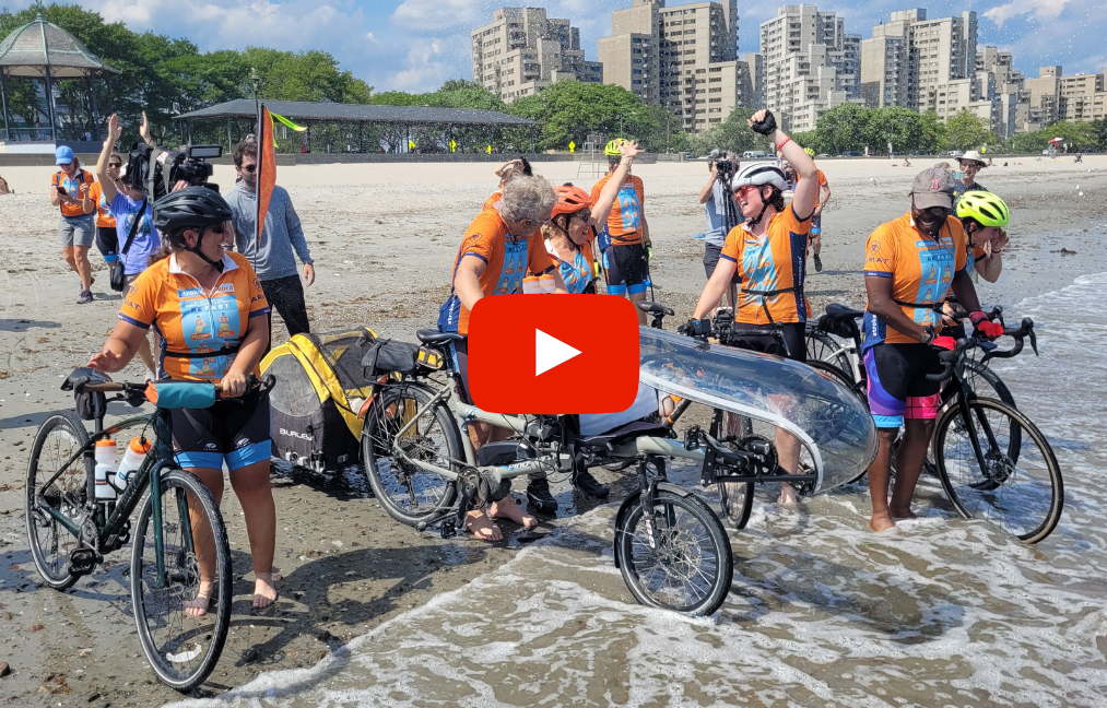Youtube video cover of a biking group on the ocean